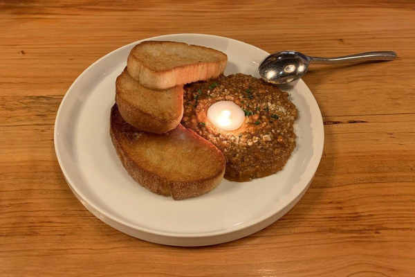 The chili at The Arbour comes with a candle of beef tallow, which you stir in as it melts