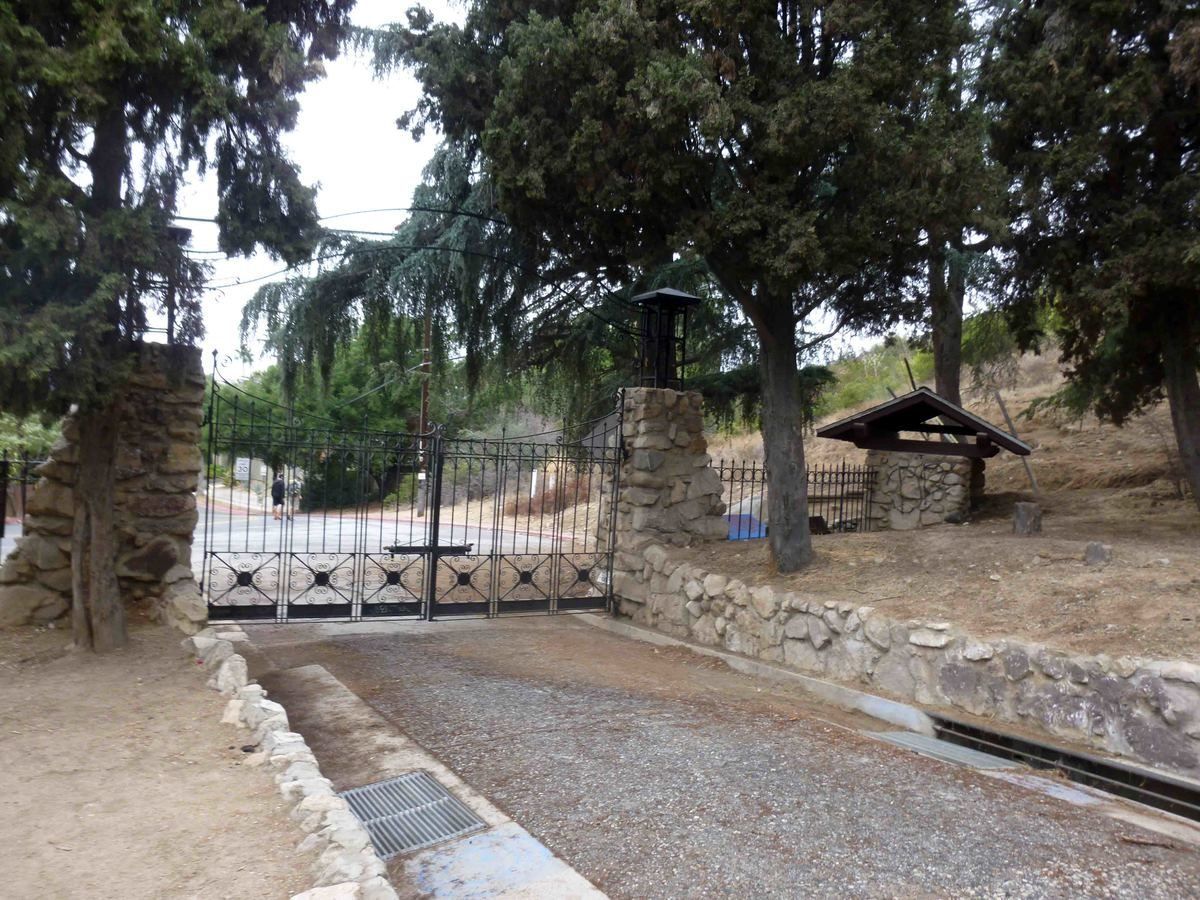 a metal gate leading to Cobb Estate in Pasadena
